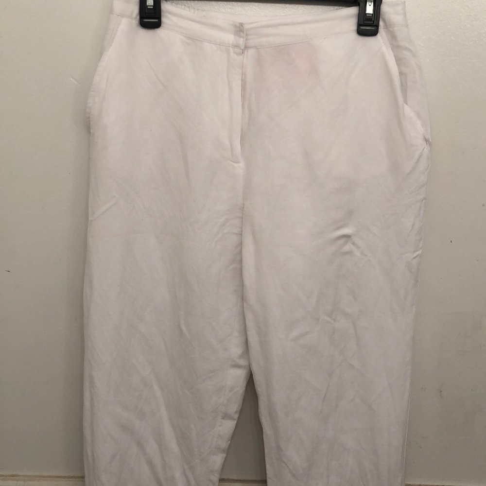 White summery pants with embellishments at ankles